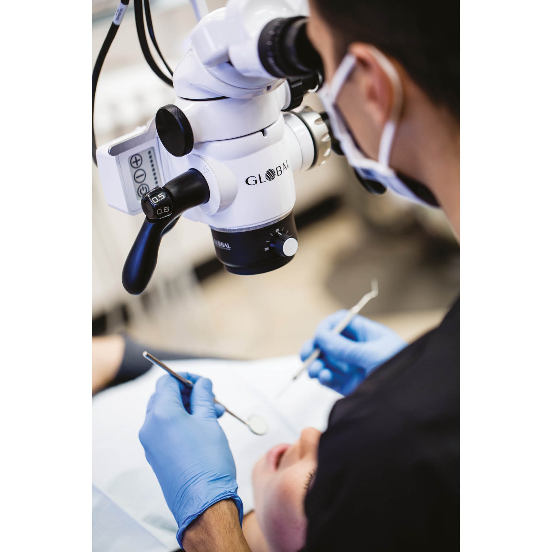 Global A-Series Dental Microscope in use with patient